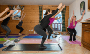 chair pose in yoga studio france skiing and yoga holiday