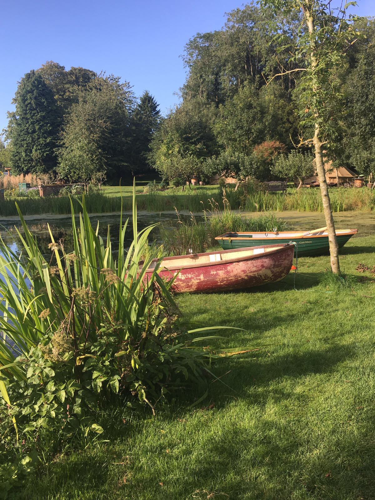 boats by lake wellness yoga retreat norfolk