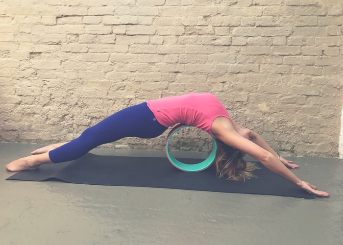 Mastering the Headstand: How a Yoga Wheel Can Help You Achieve