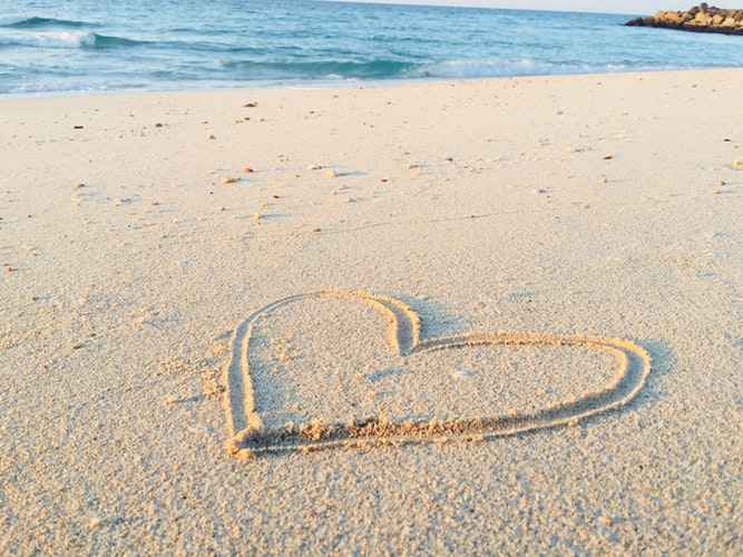 self care heart in sand