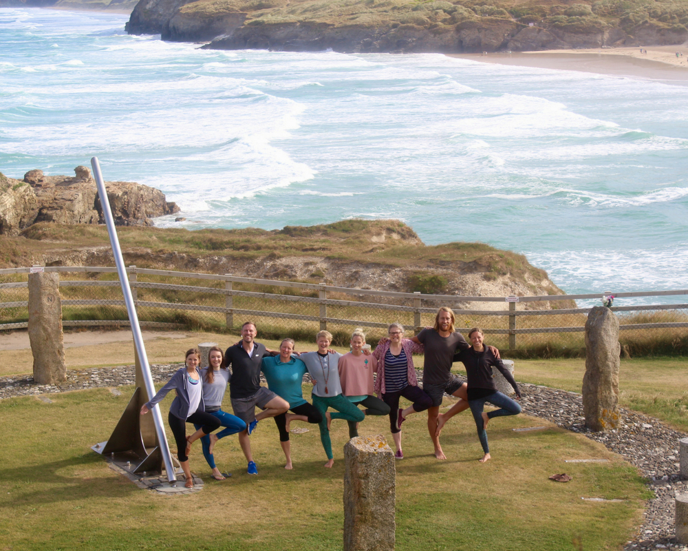 guests tree pose group photo august bank holiday yoga retreat cornwall