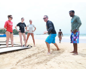 surf-lesson-beach-guests-teacher-beach-sri-lanka