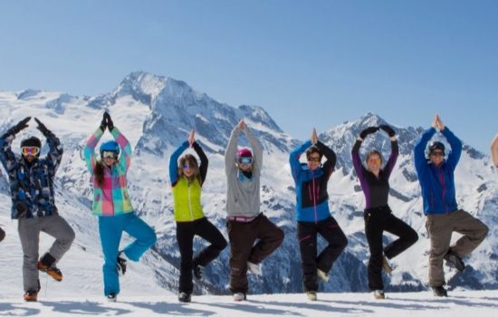 tree pose on mountain skiing yoga holiday french alps