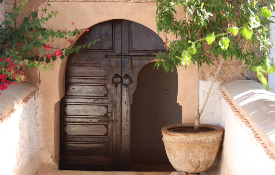 moroccan style door, walls and plant pots yoga holiday Marrakech