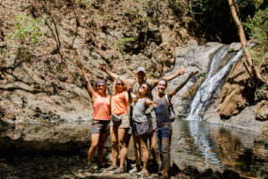 Refreshing dip in the waterfall Costa Rica