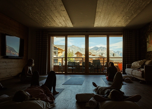 yoga class with views of the french alps