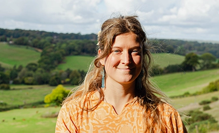 yoga teacher smiling to camera