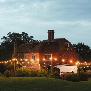 house in the night with fairylights