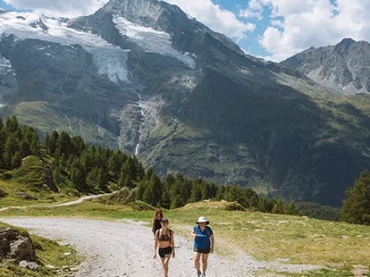 people walking on path in the french alps